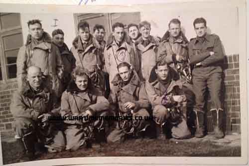 My father on right with arms folded